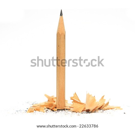 pencil in wood waste on white background