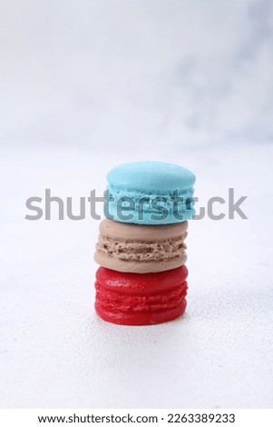 A macaron or French macaroon is a sweet meringue-based confection made with egg white, icing sugar, granulated sugar, almond meal, and food colouring. 