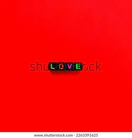 love word with red background. concept of love and romance