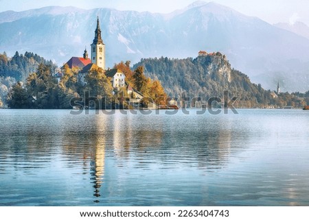 Fabulous sunny day view of popular tourist destination  Bled lake. Dramatic view of Pilgrimage Church of the Assumption of Maria. Location: Bled, Upper Carniolan region, Slovenia, Europe