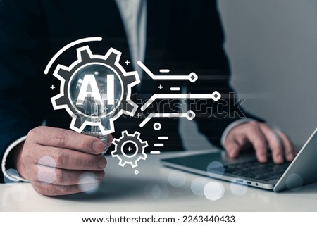 AI (Artificial intelligence) concept, cloud computing, businessman hold light bulb and touching AI infographic, gear cogs icons, creative idea, AI technology, quantum computing, automation.