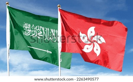 Hong Kong flag and Saudi Arabia on cloudy sky. waving in the sky