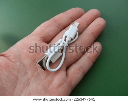 Accessory for smartphone and computer in the  hand