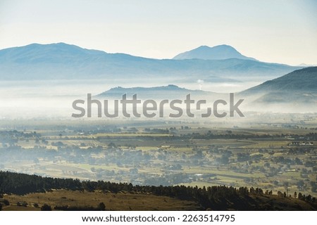 top view of Val d'Agri during a misty autumnal morning, Basilicata