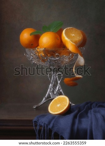 Still life with oranges in vintage vase