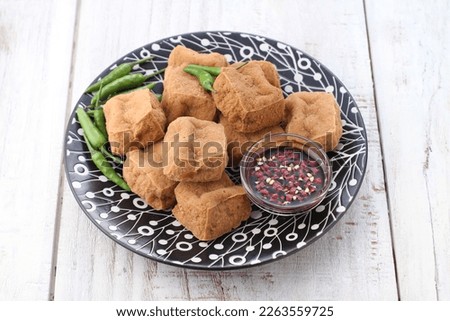 Tahu sumedang or Tahu bunkeng is a Sundanese deep-fried tofu from Sumedang, West Java, Indonesia. It was first made by a Chinese Indonesian named Ong Kino. 