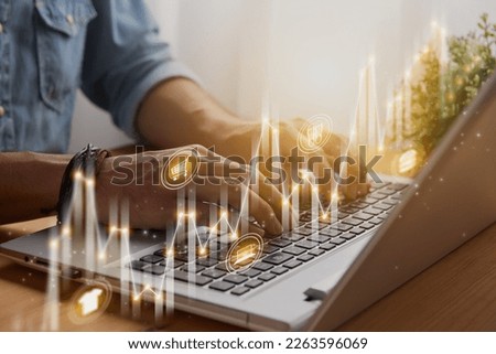 Casual Businessman Using or Typing Laptop and Slant Online Product Icon, Stock Market Bar Chart,Line Graph Trend. Consumer Discretionary,Consumer Staples Sector,Financial,Economy Concept