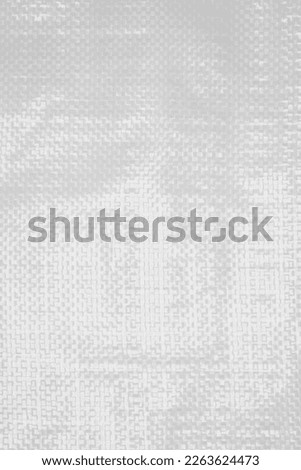texture and pattern of plastic​ bag.Polypropylene sack cloth surface. Royalty-Free Stock Photo #2263624473