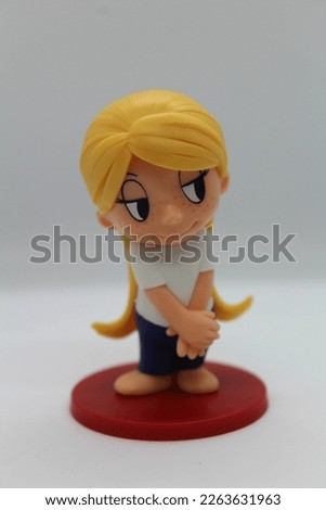 Figurine of a girl in love on a white background