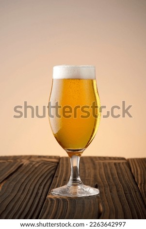 Beer in a glass with foam