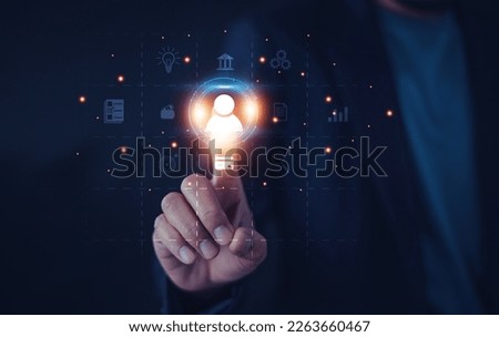 Businesspeople touching on screen to target customer. Target customer, buyer persona, customer behavior concept. Marketing plan and strategies. Personalization marketing, customer centric strategies. Royalty-Free Stock Photo #2263660467