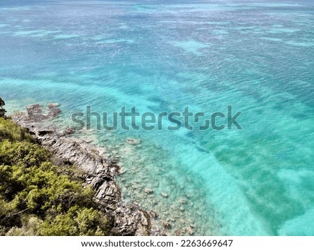 Scenic aerial view of a tropical beach and turquoise water