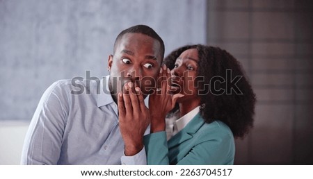 Whisper Business Secret Into Ear. Coworkers Gossiping Royalty-Free Stock Photo #2263704517