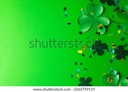 Image of green clover and copy space on green background. St patrick's day, irish tradition and celebration concept.