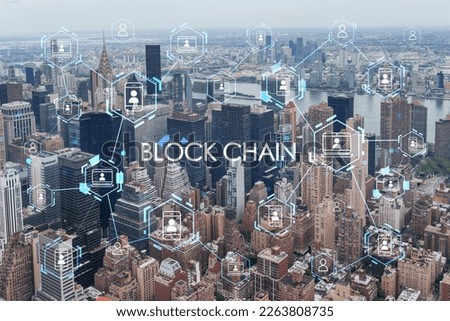 Aerial panoramic city view of Upper Manhattan area, East Side, river and Brooklyn on horizon, New York city, USA. Decentralized economy. Blockchain, cryptography and cryptocurrency concept, hologram