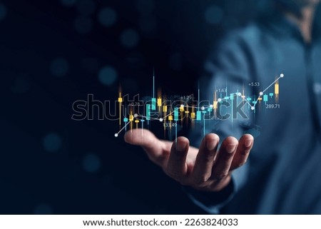Investor Planning and strategy, Stock market, business people working with technical price graph and indicator, candlestick chart and stock trading tablet screen financial investment growth concept. Royalty-Free Stock Photo #2263824033