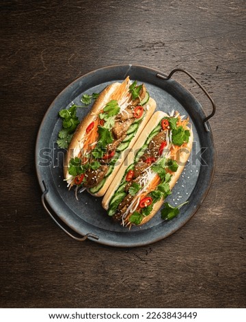 Banh mi, vietnamese sandwich with meat and vegetables, top view. Vietnamese cuisine Royalty-Free Stock Photo #2263843449