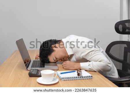 Man with narcolepsy is fall asleep on office desk.
Narcolepsy is a sleep disorder that makes people very drowsy during the day. . Royalty-Free Stock Photo #2263847635