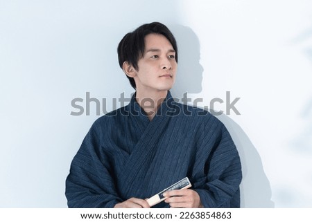 Refreshing Japanese man wearing kimono