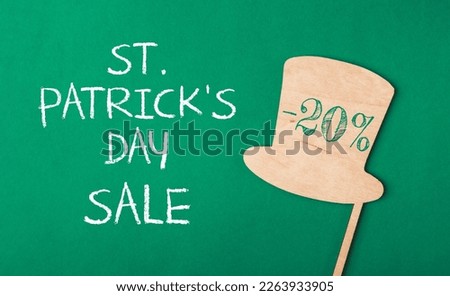 -20 sale on Patrick's day on paper background. Top view, lie flat, copy space