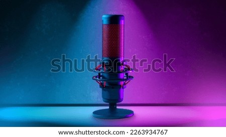 Professional condenser microphone. Using micro to record podcast. Condenser microphone in neon spotlight. Modern sound recording device. Microphone for radio announcer. Desktop micro.