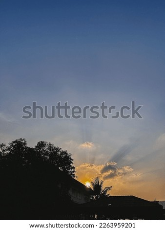 Sunset and the house roof