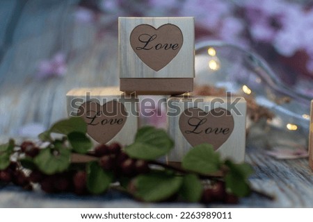 gift box with the word love. bokeh background with gift box
