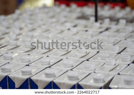 Carton box with cap, package for milk.Globalization, healthy choice nutrition and commercial concept image. Horizontal format photograph, nobody in picture.