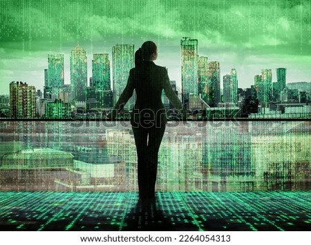 Businesswoman looking over the matrix  concept City of London. Virtual connectivity of the city. Financial district skyline with matrix background in green.