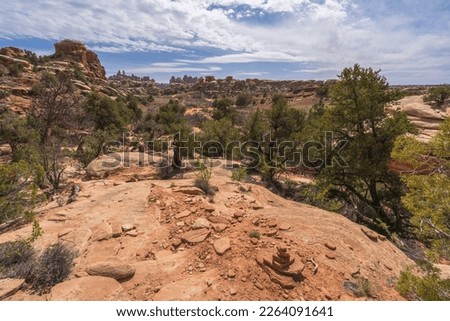 hiking the chesler park loop trail in the needles in canyonlands national park in the usa