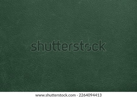 Genuine, natural, artificial green leather texture background. Luxury material for header, banner, backdrop, wallpaper, clothes, furniture and interior design. ecological friendly leatherette. Royalty-Free Stock Photo #2264094413