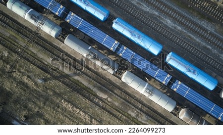Aerial top down view of train tracks, logistics cargo. Business import export logistic and transportation railway. Royalty-Free Stock Photo #2264099273