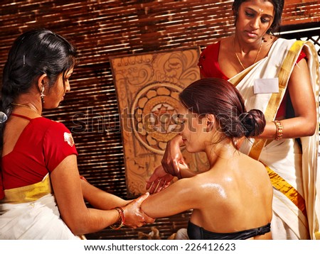 Young woman having ayurveda spa treatment.