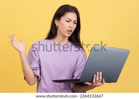 Caucasian woman having a problem with a laptop