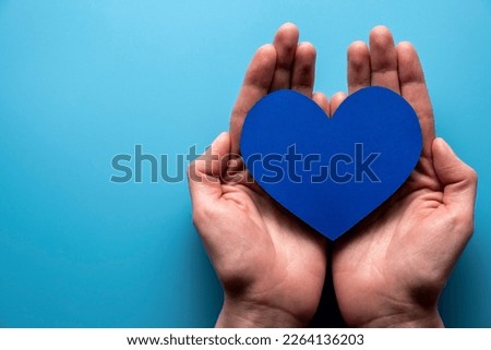 World health day. Blue heart and stethoscope on light blue background. Space for text