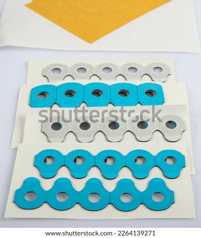 Custom Cut tape Medical Tape , Custom Die Cutting Tapes.Production of self-adhesive labels. Labeled tape rolls. Die cutting and paper cutting for label production. Royalty-Free Stock Photo #2264139271