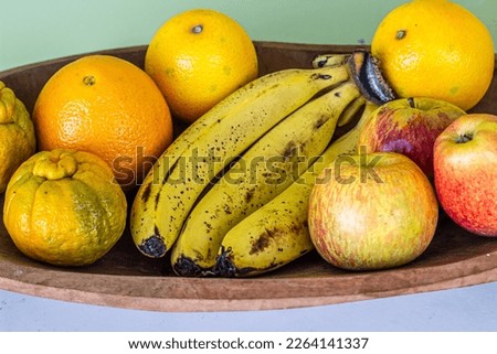This is a picture made of tropical fruits which are healthy, good for health.