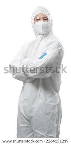 Worker wears medical protective suit or white coverall suit with mask and goggles arm crossed isolated on white background Royalty-Free Stock Photo #2264151219