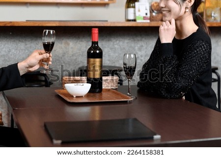 Asian women and men (couples) who enjoy drinking and eating with a smile
 Royalty-Free Stock Photo #2264158381