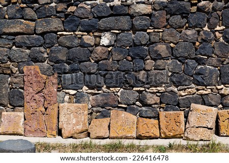 fragment of a stone wall of the ancient Christian monastery