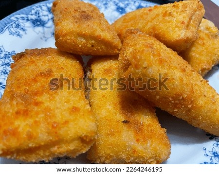 This is called Risoles, filled with potato, chicken and vegetables