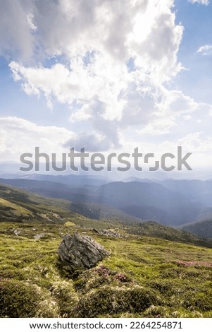 Sunlight falling on mountain hill landscape photo. Beautiful nature scenery photography with ridges on background. Ambient light. High quality picture for wallpaper, travel blog, magazine, article