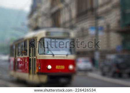 Red tram, intentional blurred background post production