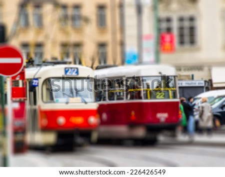 Red tram, intentional blurred background post production