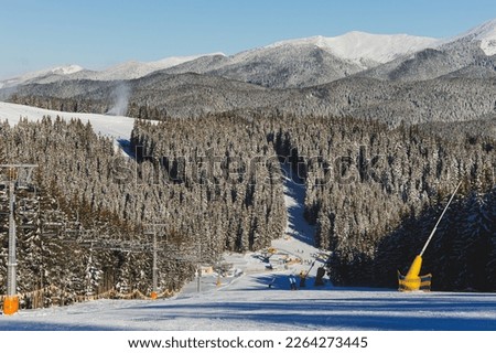 Winter landscape of snowy mountains with winter forest. Winter landscape