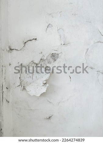 walls with peeling white paint give a unique texture