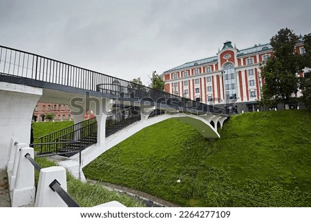 Pedestrian bridge over the road in the city Royalty-Free Stock Photo #2264277109
