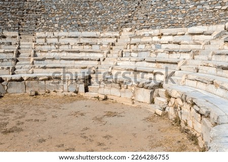 Close up view of marble sits. Ephesus Odeon. The ruins of the ancient city of Ephesus. Selected focus, copy space. Art, design or tourism concept. Selcuk, Turkey (Turkiye)