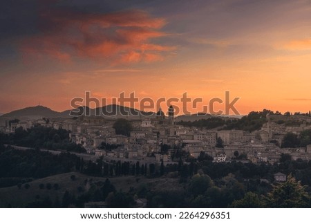 Urbino city skyline after sunset. Unesco world heritage site. Marche region, Italy, Europe.