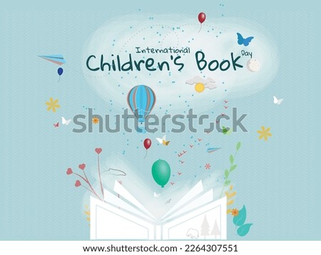 International children's and young people's book day..Open book and from it come out flowers, balloons, sun, moon, butterflies, animals, on blue background.
